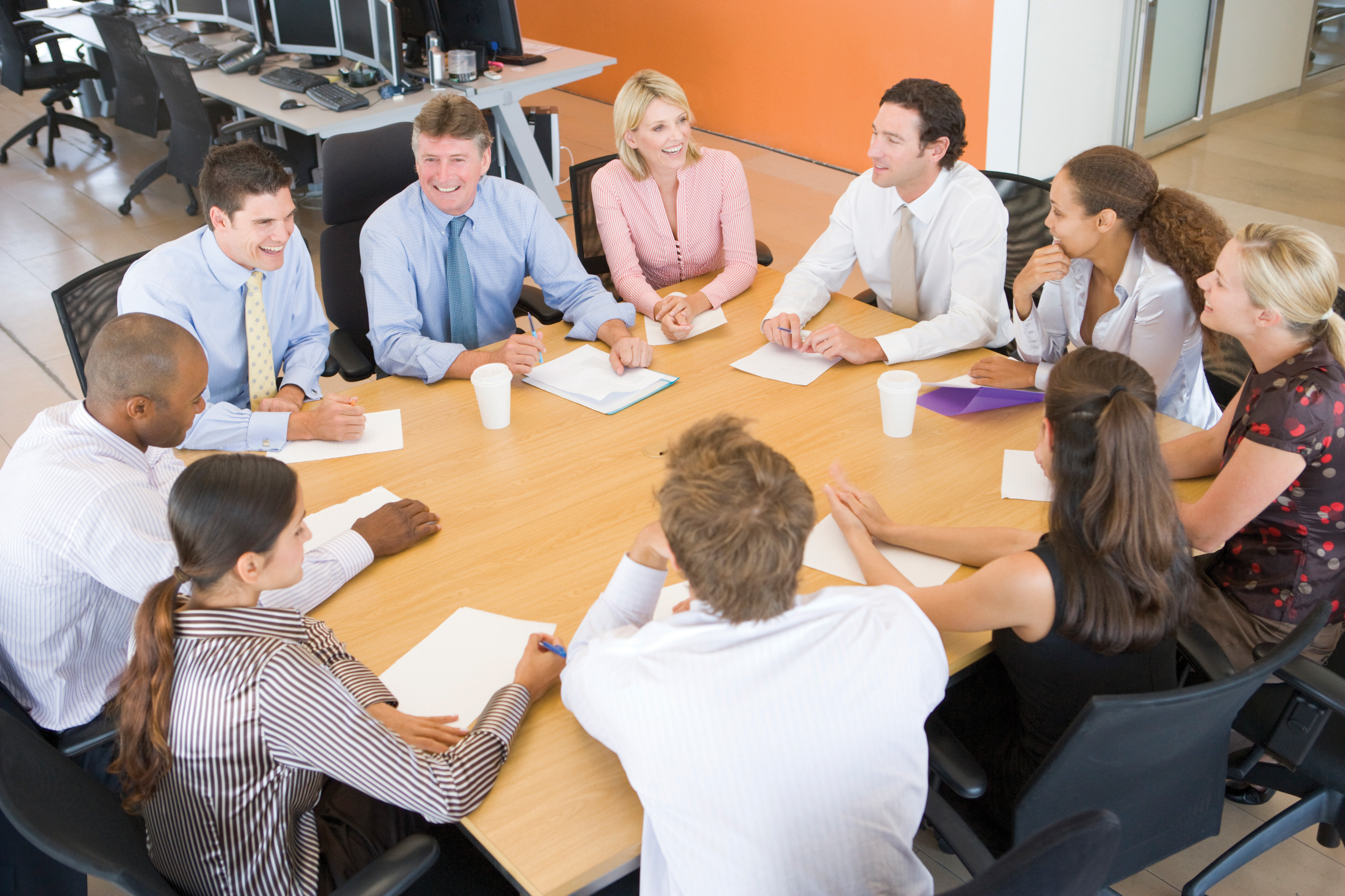 group-discussion Stock Traders In A Meeting